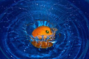 Vibrant Orange Water Splashes Captivating Dance